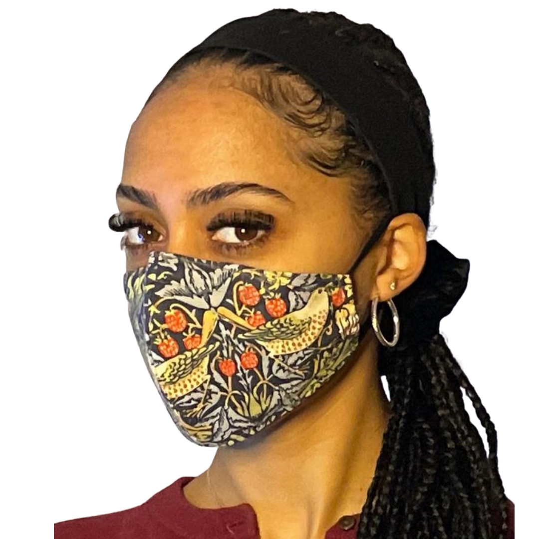 Woman in face mask using Strawberry Thief design by William Morris